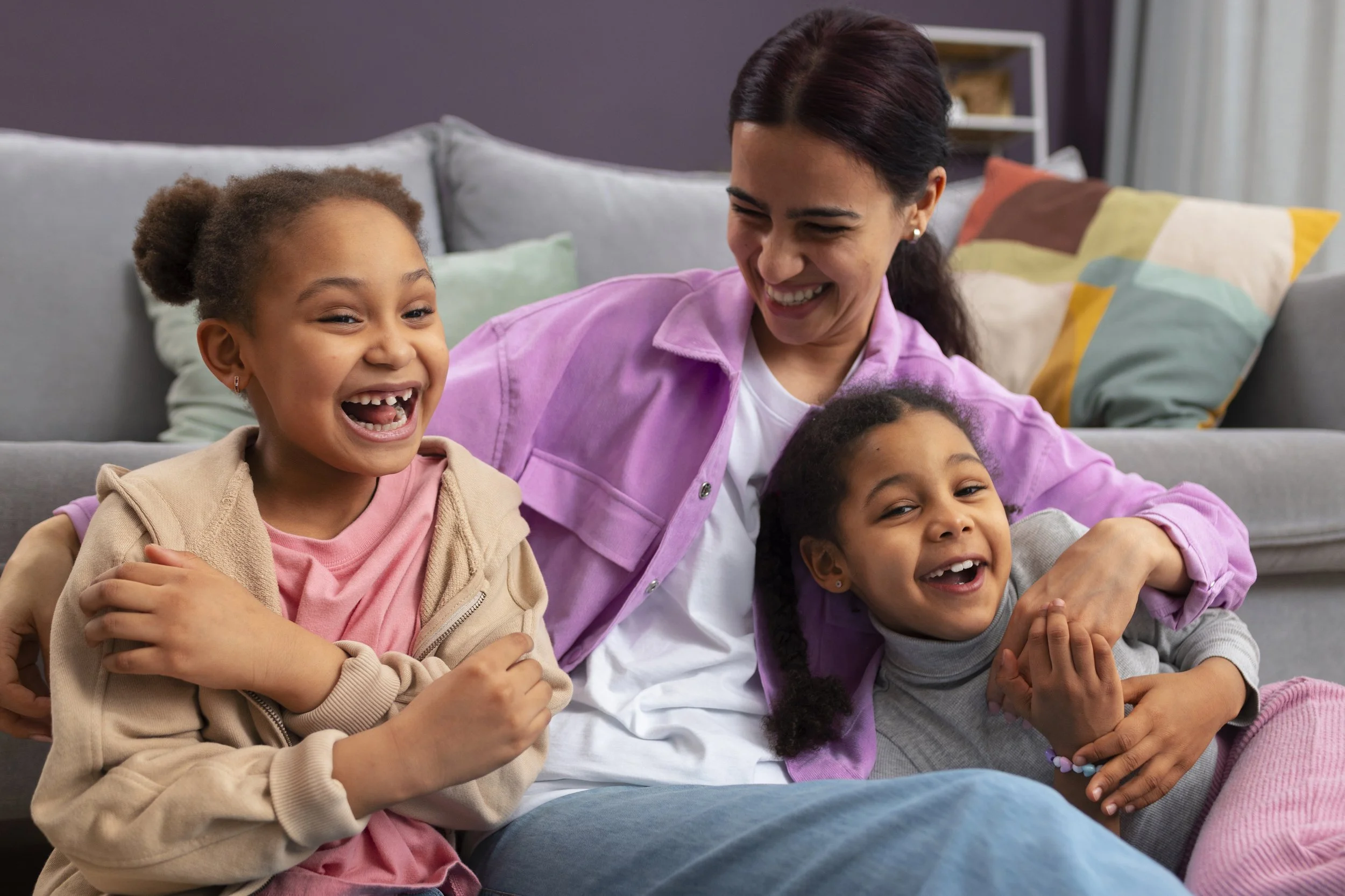 Caregiver spending time with children at home